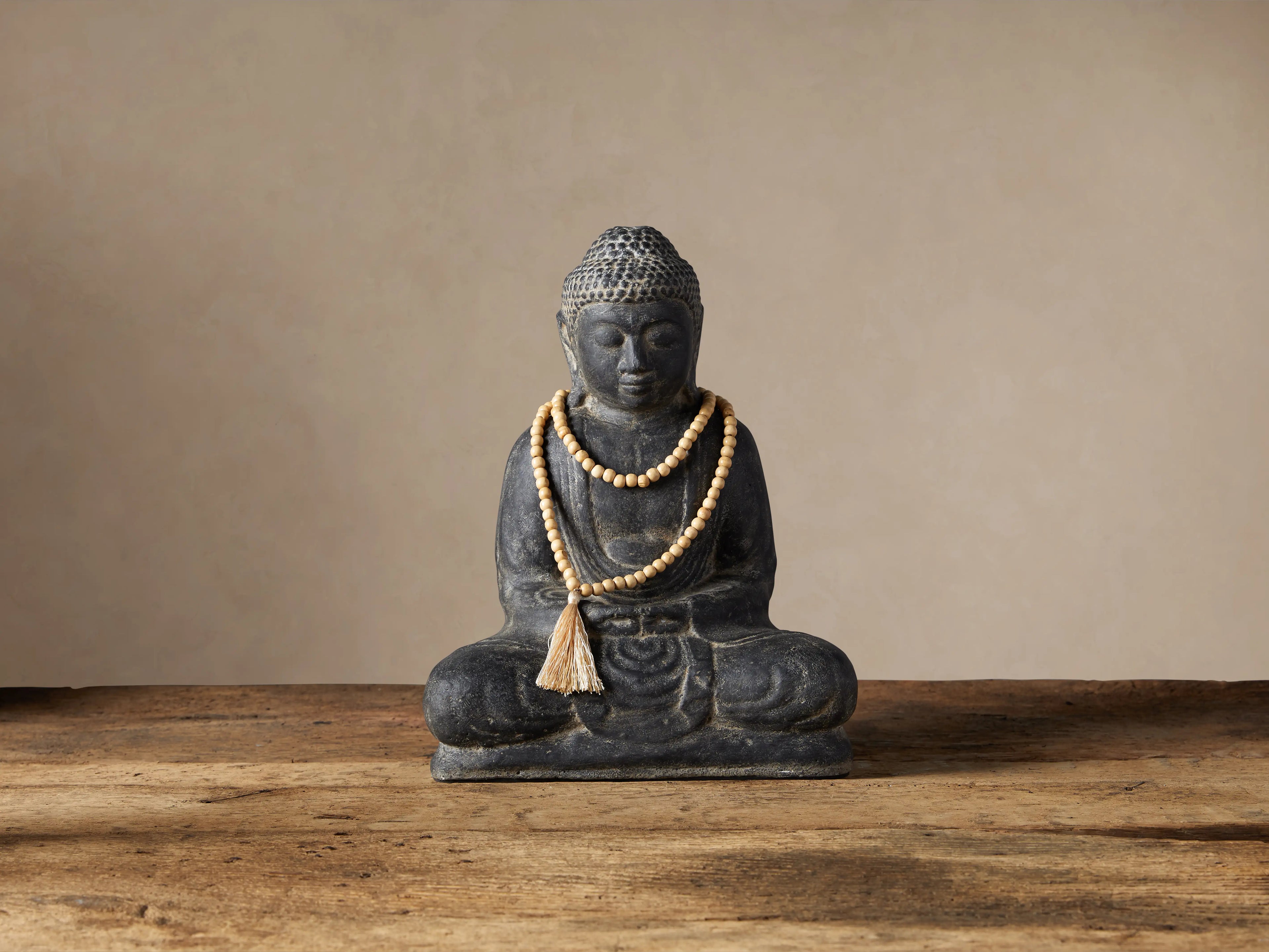 Stone Buddha with Mala Beads